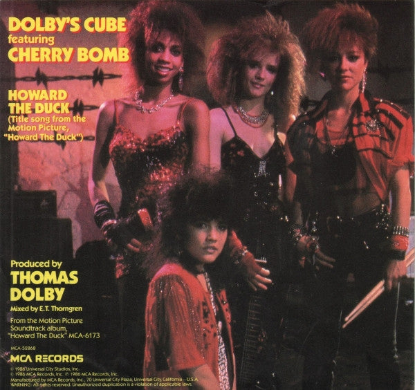 Dolby's Cube Featuring Cherry Bomb (2) : Howard The Duck / Don't Turn Away (7", Single)